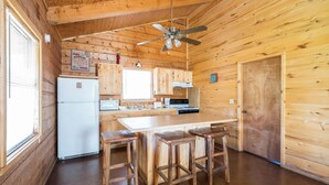 Private kitchen - Riverfront Cabins  and  Vacation Homes (Rio Frio)