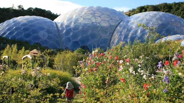 A garden with large geodesic domes, a pathway, and a person walking. - 3 Bed in Looe (oc-92273) (Polperro)