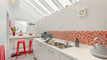 Oven, high chair, cookware/dishes/utensils