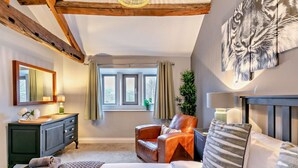 A bedroom with a bed, a chair, a dresser, a mirror, and a window. - 6 Bed in Huddersfield (oc-93984) (Huddersfield)