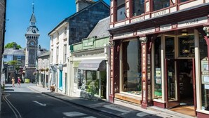 A street view with a building labeled 'BOOTH Richard Books Bought Anywhere.' - 3 Bed in Brecon (oc-93680) (Llandefalle)