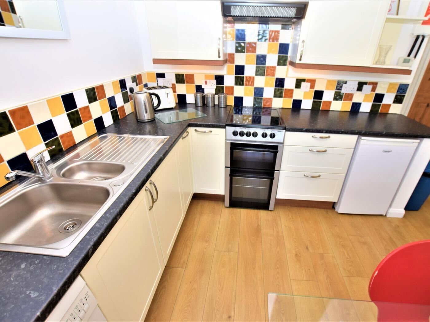 Oven, dishwasher, high chair, cookware/dishes/utensils
