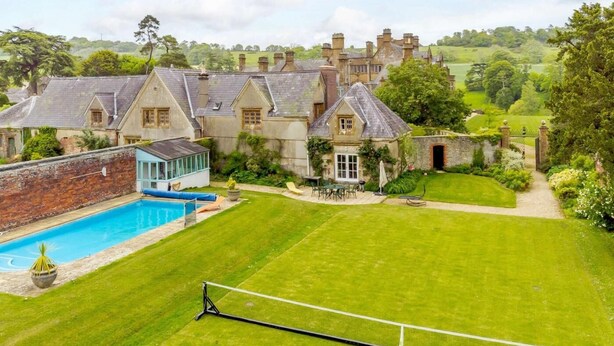 A large estate with a swimming pool, tennis court, and a well-maintained lawn. - 8 Bed in Dorchester (oc-93723) (Minterne Magna)