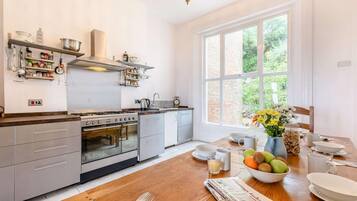 Oven, dishwasher, highchair, cookware/dishes/utensils