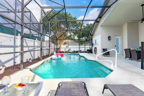 Outdoor pool, a heated pool - Spacious 6-bedroom pool house near Disney (Kissimmee)