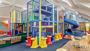 A play area with a multi-level climbing structure, a slide, and seating areas. - 3 Bed in Crediton (oc-waie2) (Zeal Monachorum)