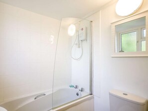 A bathroom with a glass-enclosed shower, a bathtub, and a toilet. - 1 Bed in Aberdovey (oc-87910) (Aberdovey)
