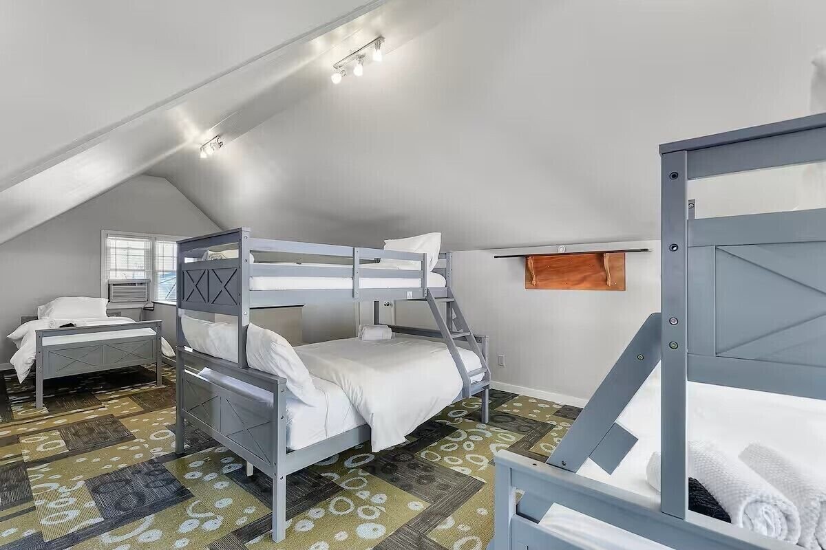 A favorite for little travelers! This fun loft features two bunk beds, a twin bed, and a dedicated kids play area where they can hang out and have fun!