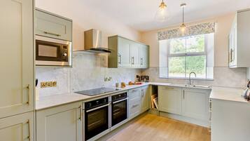 Oven, dishwasher, high chair, cookware/dishes/utensils