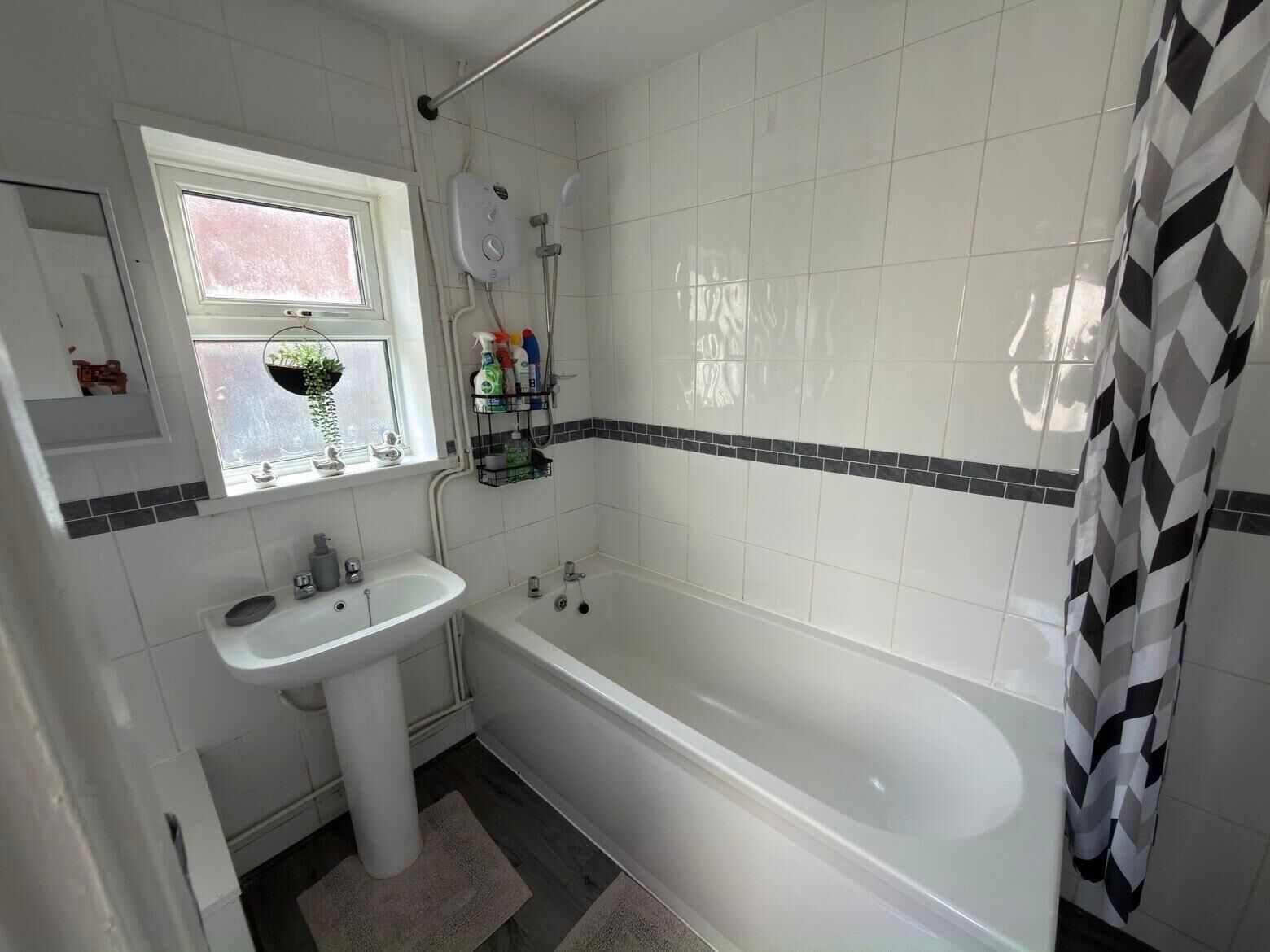 Shower, hair dryer, towels, shampoo