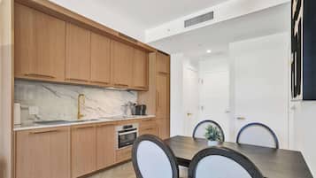 Deluxe Condo, Balcony | Private kitchen