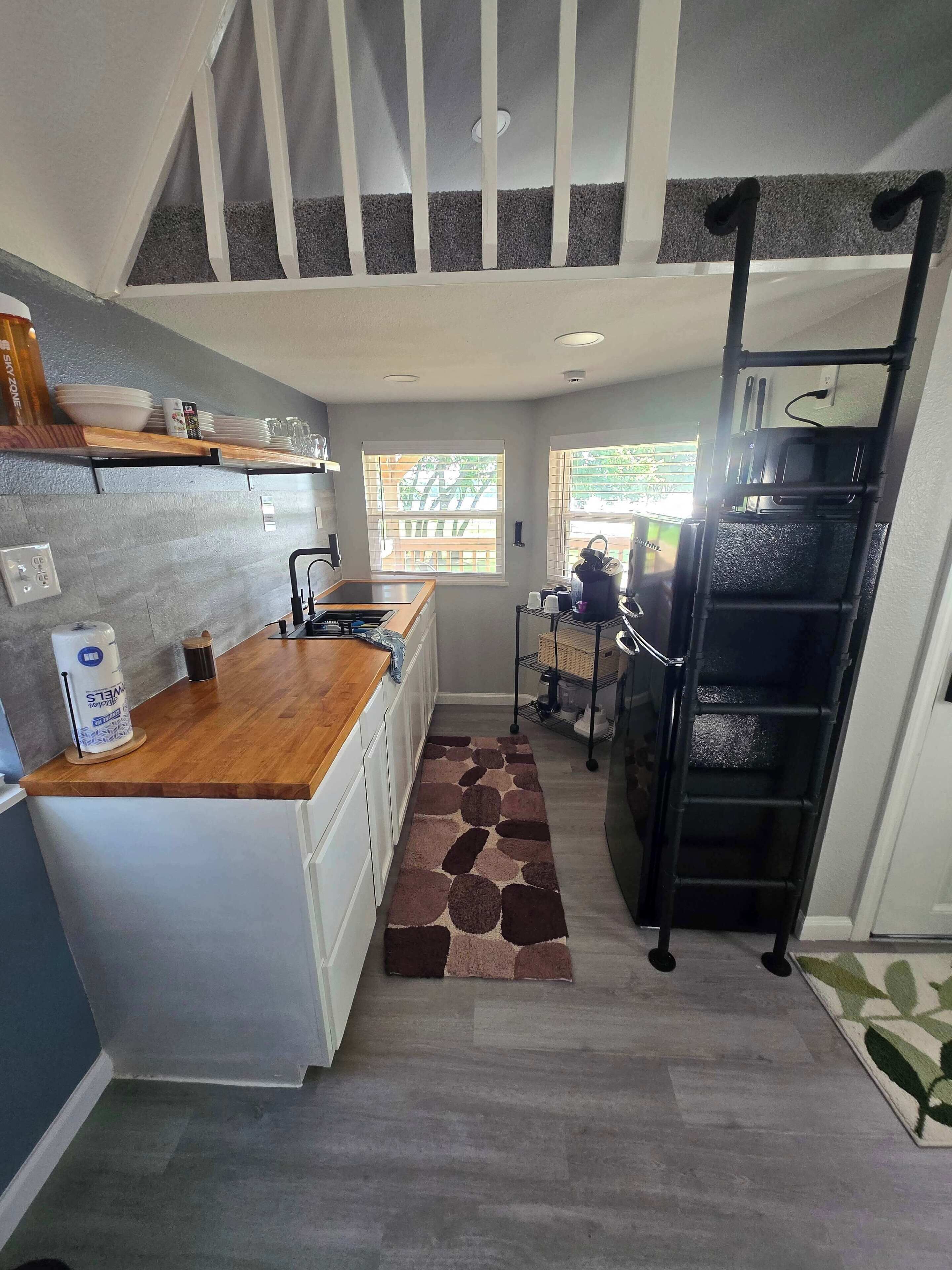 Fridge, microwave, stovetop, coffee/tea maker