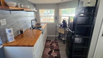 Fridge, microwave, stovetop, coffee/tea maker