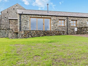 A stone building with a large window and a chimney. - 2 Bed in Ulverston (oc-93091) (Osmotherley)