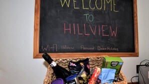 A welcome sign with 'WELCOME TO HILLVIEW' and Wi-Fi details. - 6 Bed in Ilfracombe (oc-52585) (Combe Martin)