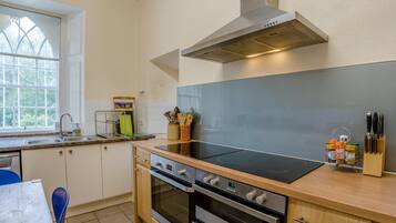 Oven, dishwasher, highchair, cookware/dishes/utensils
