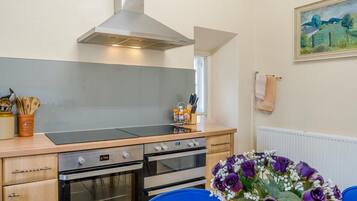 Oven, dishwasher, highchair, cookware/dishes/utensils