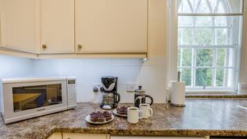 Oven, dishwasher, highchair, cookware/dishes/utensils