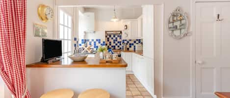 Oven, dishwasher, high chair, cookware/dishes/utensils