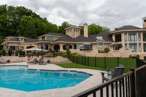 Pool - Overlook Retreat Manor is a luxury private estate on 100 scenic acres for up to 24 guests. Enjoy the pool, hot tub, game room, sports court, and breathtaking sunset views. The kind of place people talk about long after they leave. (Sinking Spring)