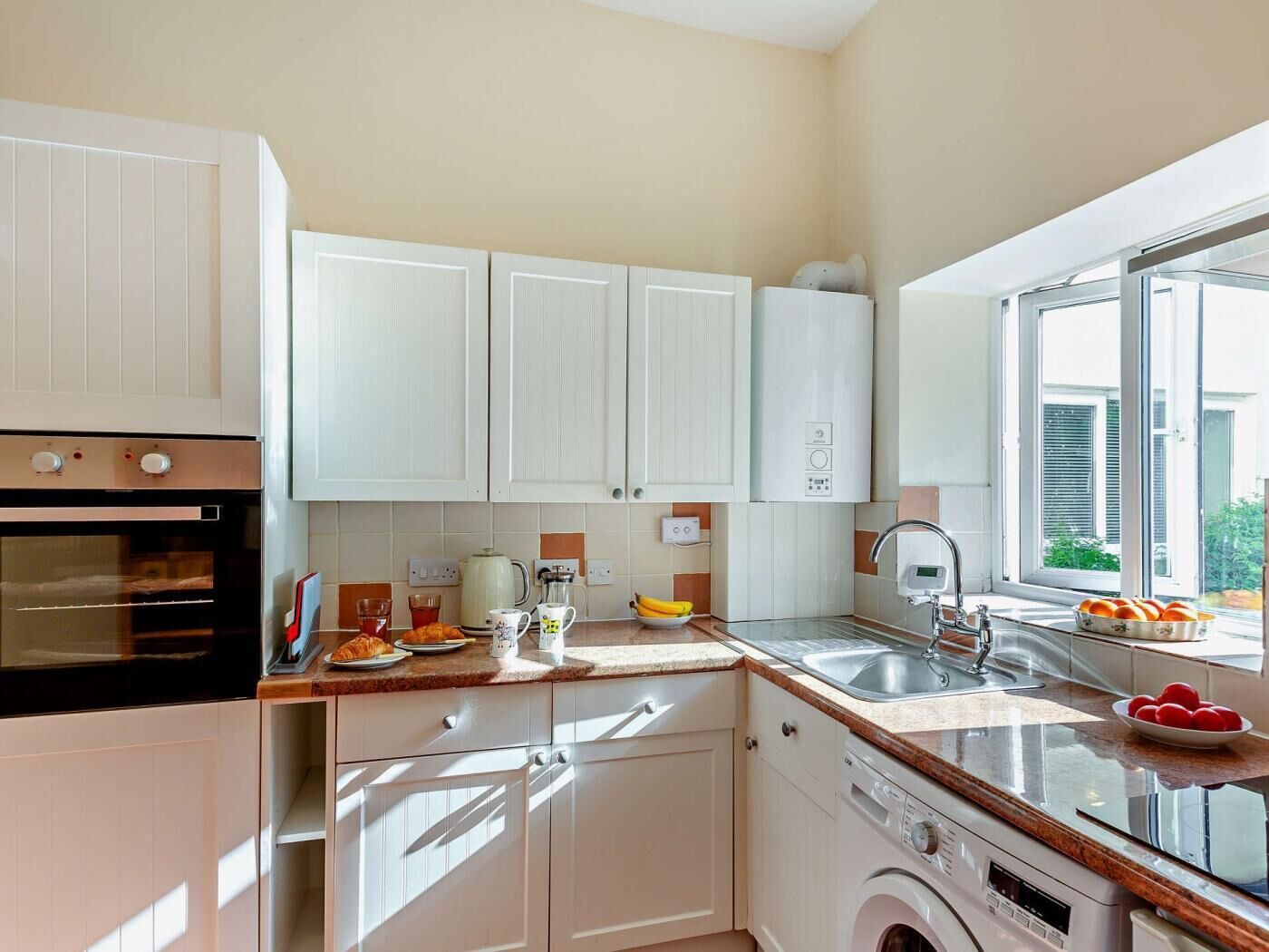 Microwave, oven, cookware/dishes/utensils