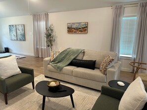 Living area - New construction, Cozy family retreat in New Caney with comfort and charm (New Caney)