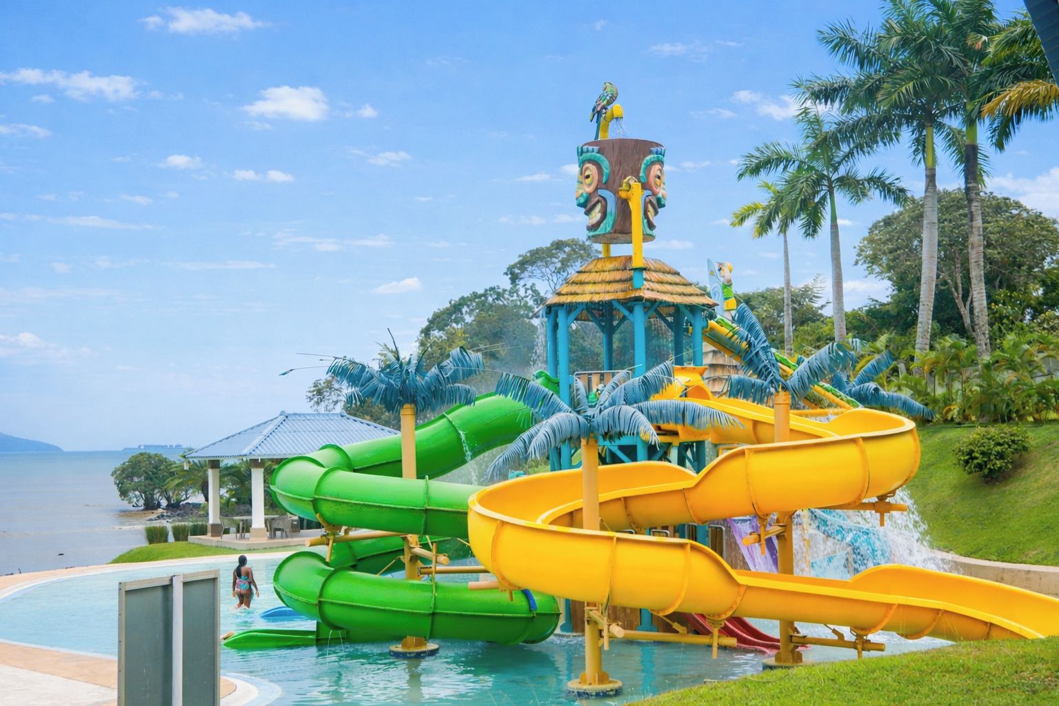 A water park with multiple slides and a pool area.