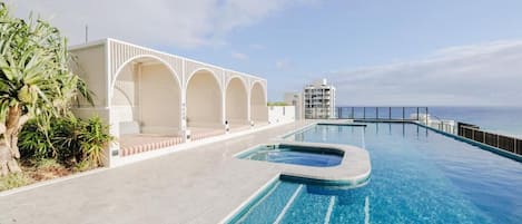 Outdoor pool, open 6:00 AM to 10:00 AM, free cabanas, sun loungers