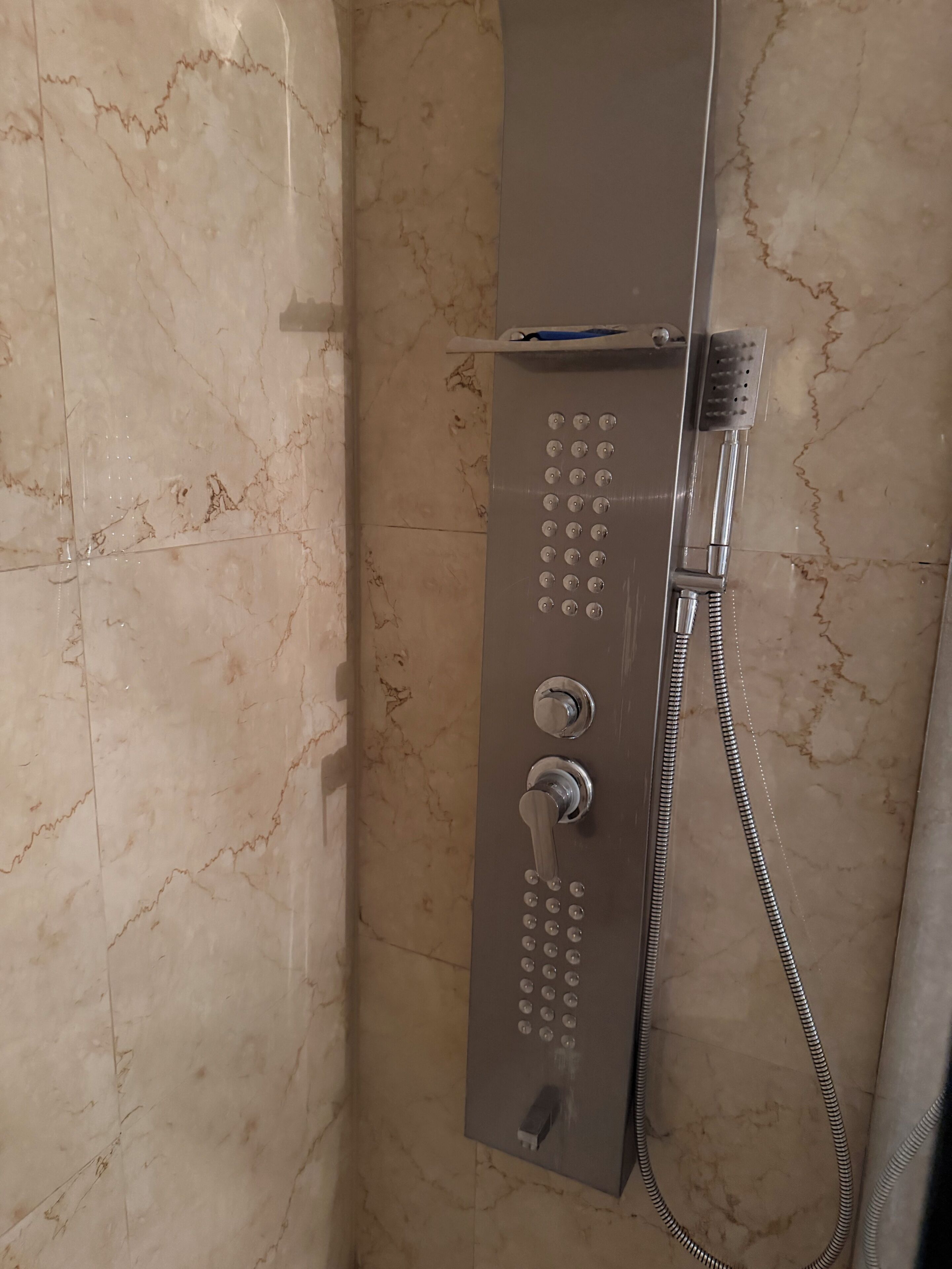 Shower, towels, toilet paper