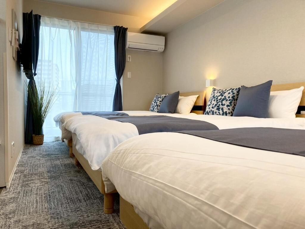 Duplex, 2 Bedrooms, Non Smoking | Desk, blackout curtains, iron/ironing board, free WiFi