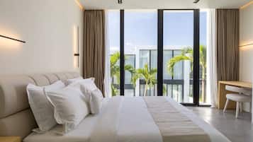 Apartemen Deluks, 3 kamar tidur, pemandangan kolam renang | Seprai antialergi, minibar, Wi-Fi gratis, dan seprai linen