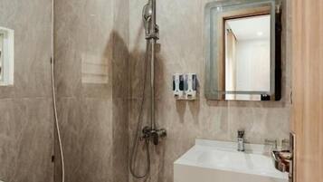 Shower, free toiletries, hair dryer, slippers