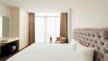 In-room safe, desk, laptop workspace, blackout curtains