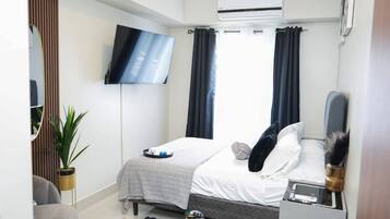 2 slaapkamers, een strijkplank/strijkijzer, gratis wifi, beddengoed