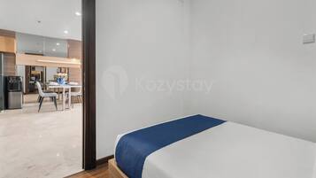 Apartment, 2 Bedrooms, City View | Desk, laptop workspace, iron/ironing board, free WiFi