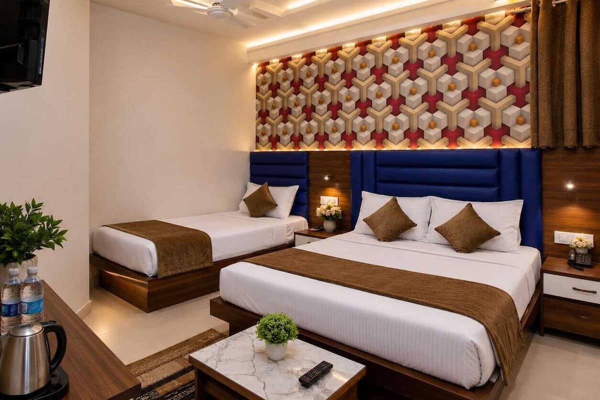 Habitación familiar | Sábanas de algodón egipcio y ropa de cama de alta calidad