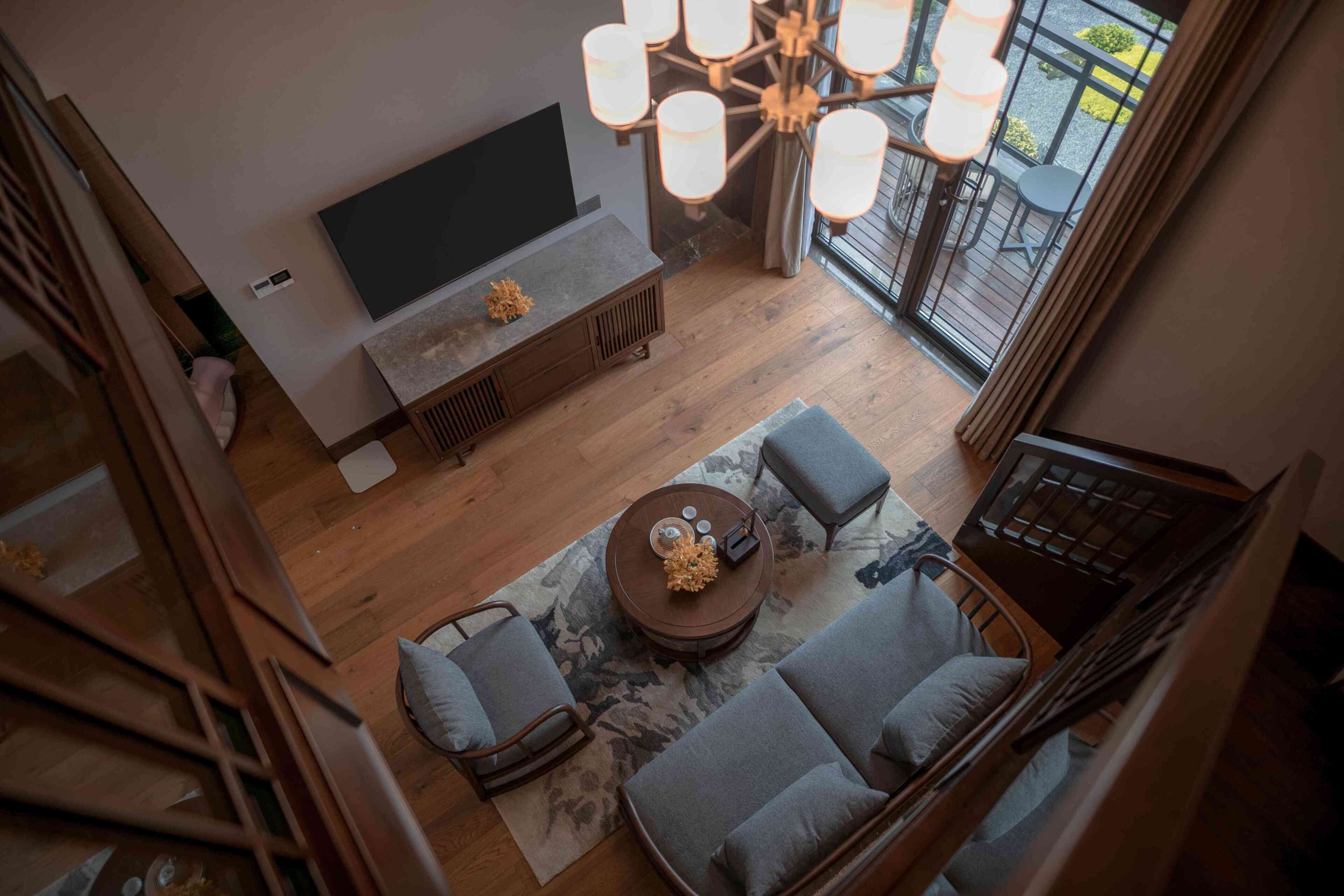 Family Suite, Balcony, Courtyard View | Living area | 32-inch TV with cable channels