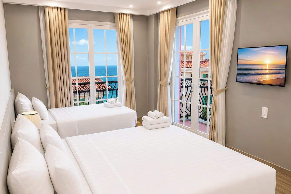 Family Double Room, Balcony, Beach View | Laptop workspace, free WiFi
