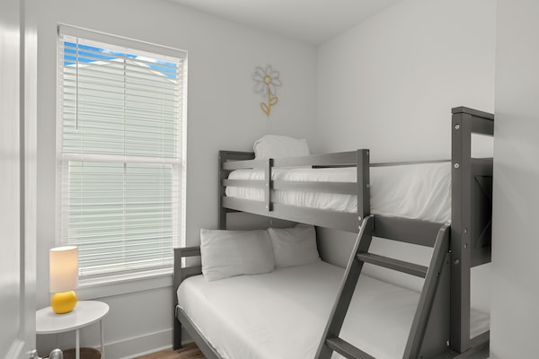 Bedroom 4 features a twin-over-full bunk bed.