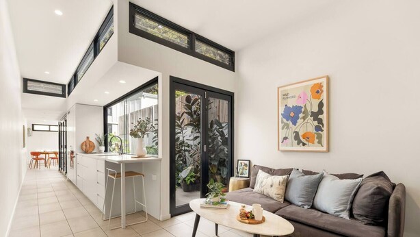 A modern interior with a kitchen, dining area, and living space. - Modern Designer Terrace Next to Surry Hills (Redfern)