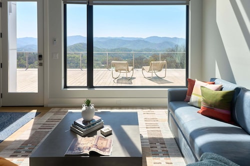 The Glass House |  Mountain-view 2BR retreat with hot tub, deck, and full kitchen.