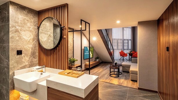 A modern bathroom with dual sinks, a large mirror, and a wooden vanity. - Inmo Hotel Chengdu Chunxi Road Taikoo Li (Chengdu)