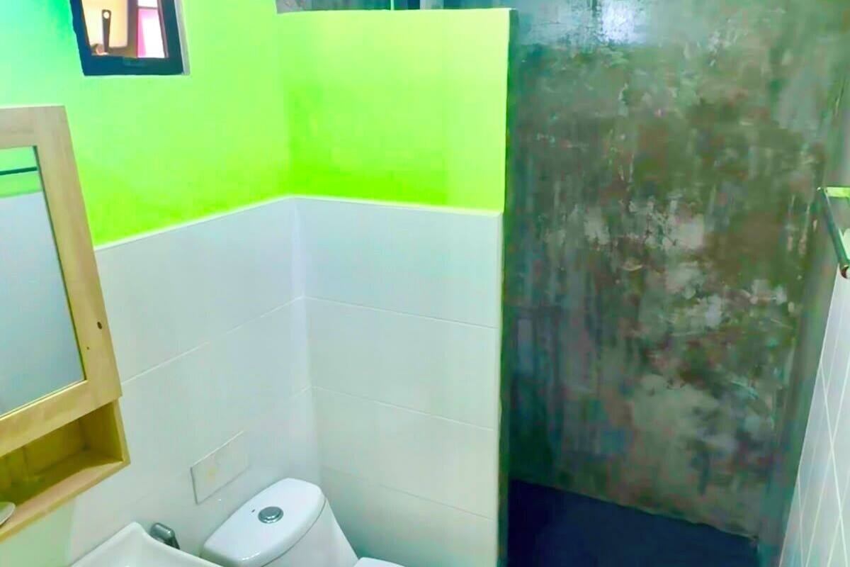 Deluxe Bungalow, Balcony, Pool View | Bathroom | Hair dryer, towels, soap, shampoo