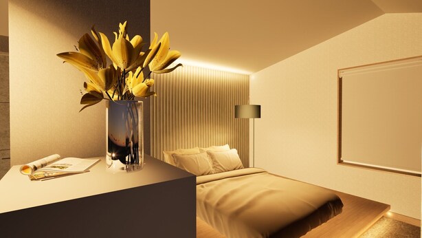 A modern bedroom with a bed, bedside table, lamp, and a vase with flowers. - Giraffe Nakasu haku (Fukuoka)