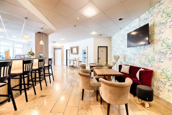 Relax in the lounge with comfy seating and entertainment.