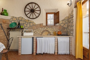 Fridge, microwave, toaster, cookware/dishes/utensils