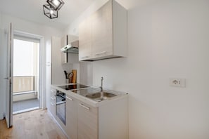 Private kitchen - A modern and bright 83-square-meter apartment, perfect for five people, located on the first floor of a recently built building with an elevator (NOT accessible to people with disabilities).The property is situated in a quiet area, ideal for those wishin (Bari)
