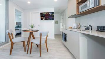 Departamento, vista a la ciudad | Cocina privada