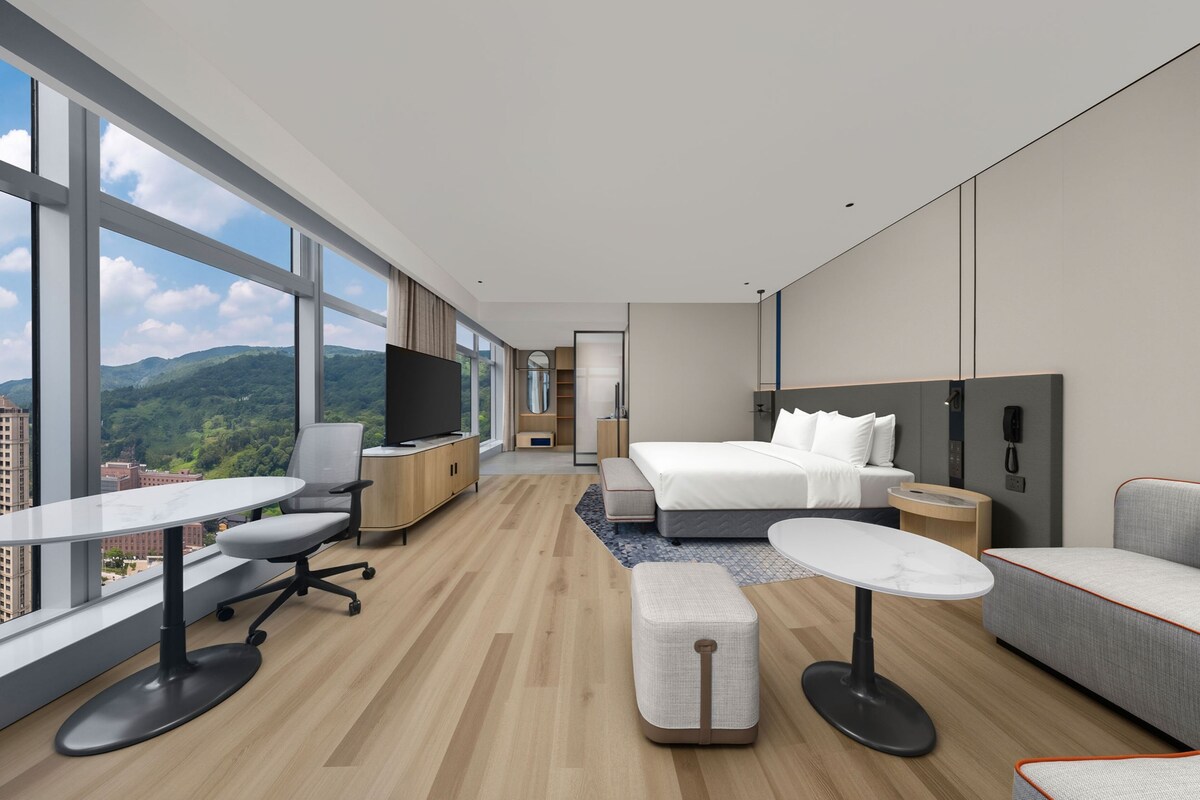Quarto standard (Extra Floor Space) | Edredons de pluma, escrivaninha, cortinas blackout, berços grátis