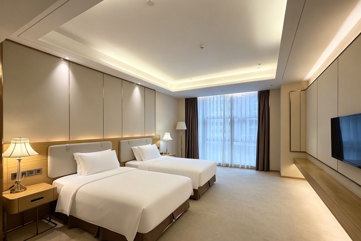 Business tweepersoonskamer | Donsdekens, Select Comfort-bedden, een kluis op de kamer